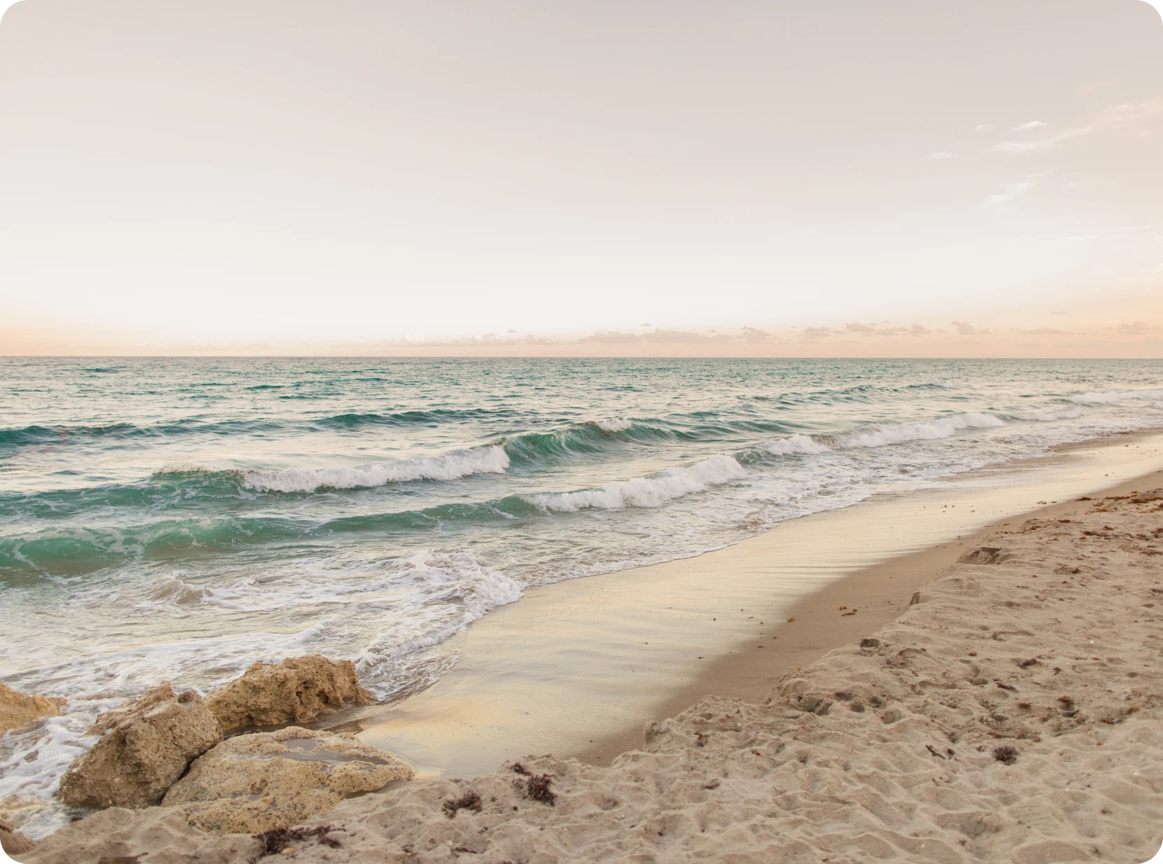 Serene coastline at sunset